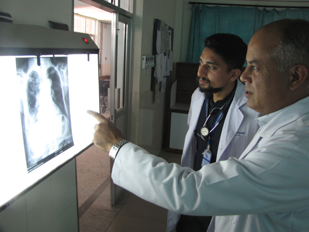 Residency program director Paras Acharya MD right explains radiographic findings to internal medicine resident Abhishek Tiwary MBBS Photo courtesy of Mark Zimmerman MD